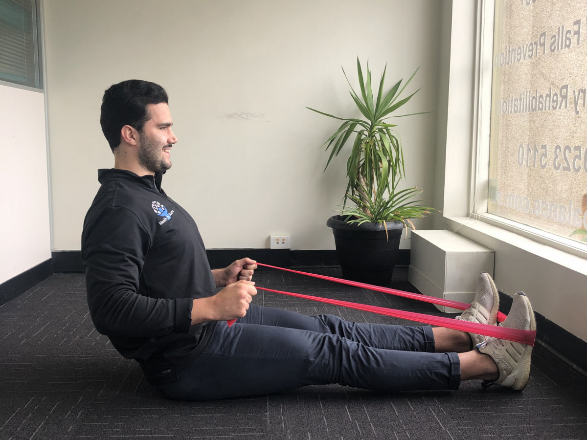 Theraband discount rowing exercise